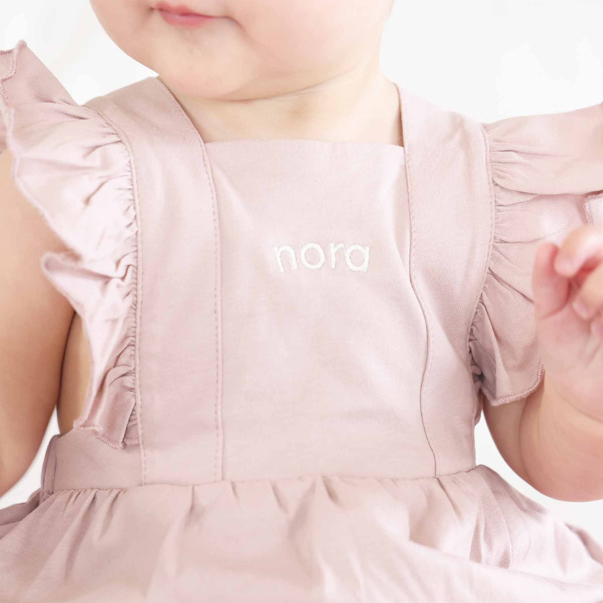 Embroidered Cross Back Ruffle Bubble Romper